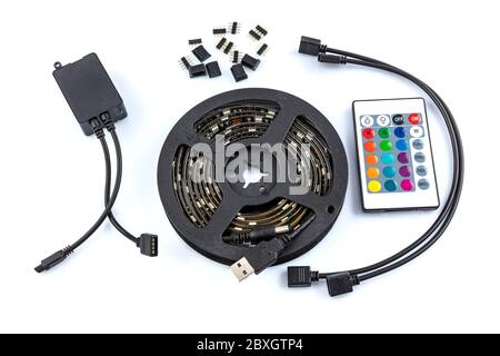 Usb led strip kit, Led backlight kit. Reel of RGB led strip light with remote control on white background Stock Photo