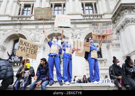 Protesters outside the Foreign and Commonwealth Office during the Black Lives Matter protest rally in Whitehall, London, in memory of George Floyd who was killed on May 25 while in police custody in the US city of Minneapolis. Stock Photo