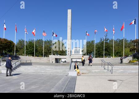 Brest, France - September 19, 2019: People walking and resting at War memorial on the Liberty square. The Monument aux morts was erected in 1954 in memory of Brest residents died in wars Stock Photo