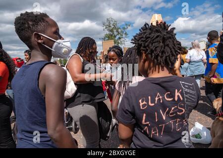 Glasgow, Scotland, UK. 7th June, 2020. Demonstrators take part in the Black Lives Matter rally, in Glasgow Green, protesting against the death of George Floyd who died in police custody on 25th May in Minneapolis, Minnesota, USA. Credit: Skully/Alamy Live News Stock Photo