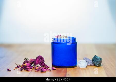 rose pedal sea salt in blue recycled glass jar Stock Photo