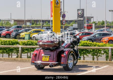 1600cc Harley-Davidson Tri Glide Ultra Classic three wheeled motorcycle with the personalised number plate CW15 HOG referring to Harley Owners' Group. Stock Photo