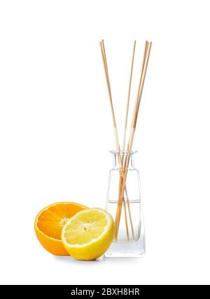 Citrus reed diffuser on white background Stock Photo