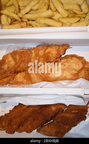 The fish and chips originated in England and is the most common take away food in the UK and particularly in English speaking and Commonwealth nations Stock Photo