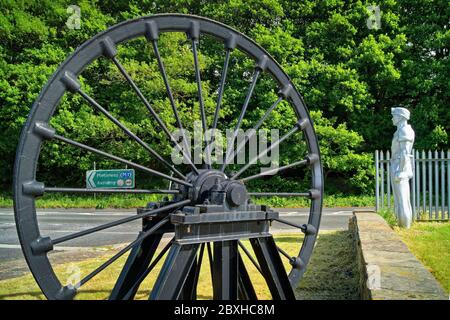 UK,West Yorkshire,Wakefield,Metal Miner Sculpture and Pit Wheel,National Coal Mining Museum,Caphouse Colliery on New Road,Overton Stock Photo