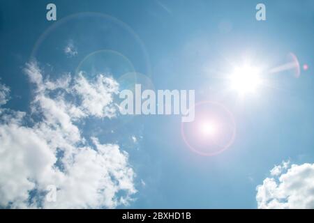 Blue sky surface with lens flare Stock Photo