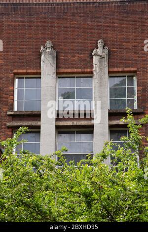 The concrete figures of Healing and Charity Ravenscourt Park Hospital, Hammersmith West London UK Stock Photo