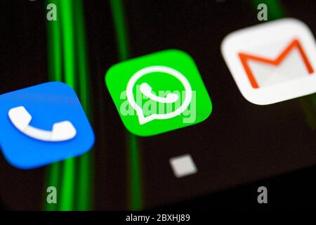 Burgos, Spain - April 13, 2020: WhatsApp, phone and gmail application icon on smartphone screen .  Stock Photo