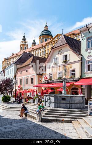 MELK, AUSTRIA - JULY 21, 2019: Restaurants with gardens on Town Hall Square on sunny summer day, Melk, Austria. Stock Photo