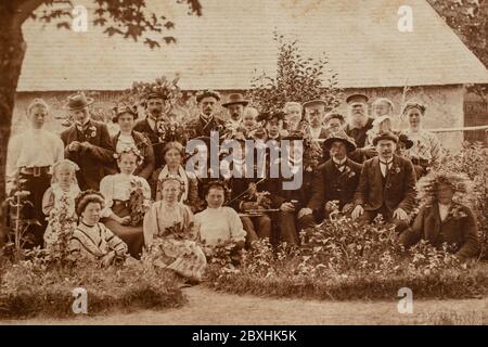 RUSSIA - CIRCA 1905 - 1910: Group photo of party guests. Vintage historical archive Carte de Viste Edwardian era photo Stock Photo