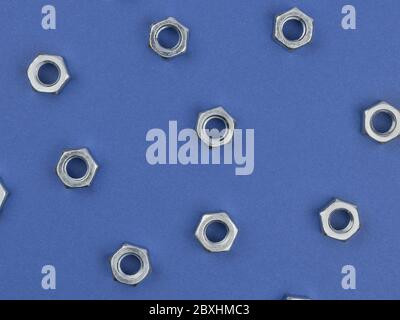 Nuts on blue background close-up. Stock Photo