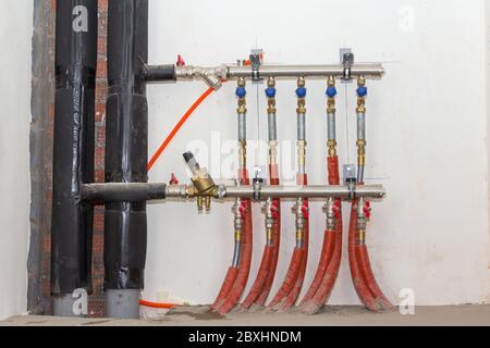 Pipes for water. Water system in a new house. Installation of pipes for water supply Stock Photo