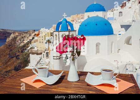 Coffee and Breakfast for two on the beach of Santorini Stock Photo