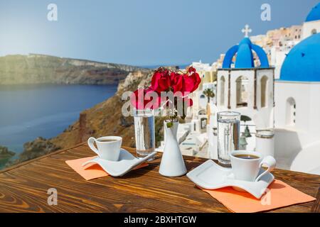 Coffee and Breakfast for two on the beach of Santorini Stock Photo