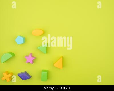 Colored geometric shapes on a green background. Stock Photo