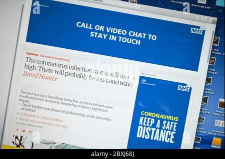UK government adverts 'Call or video chat to stay in touch' and 'Coronavirus, keep a safe distance' Stock Photo