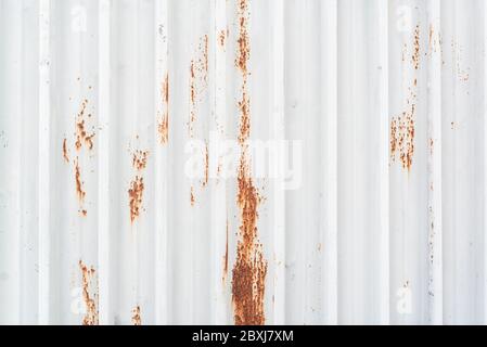 Red spots of rust on the white metal texture construction copy space for text title abstract Stock Photo