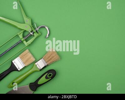 top view of a builder with a brush and spatula for applying putty on wood.  It is a process with a spatula. Free space for advertising, text Stock  Photo - Alamy