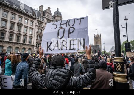 Thousands of Black Lives Matter (BLM) activists and supporters gather in Westminster, London to protest the death of George Floyd in the US. Stock Photo