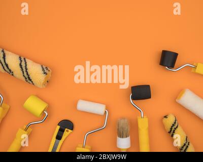 Manual painting tools on orange background. A paint tool for Wallpaper. Stock Photo