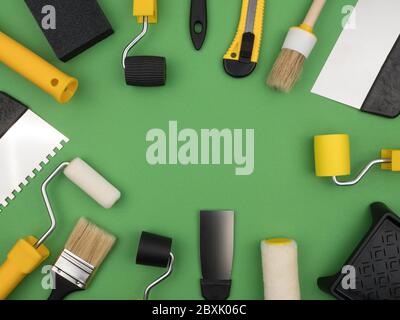 A set of tools for painting on a green background. Stock Photo