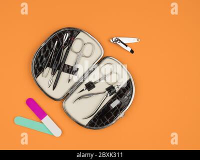 Professional set for the care of hands on an orange background. Stock Photo