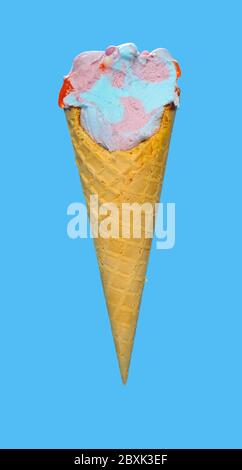 side view marshmallow and raspberry flavor ice cream cone with couple of bites on blue background Stock Photo