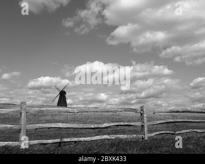 Beacon Mill windmill, standing in a field near the A259 at Rottingdean, East Sussex Stock Photo