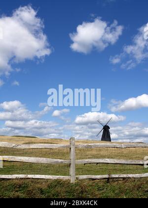 Beacon Mill windmill, standing in a field near the A259 at Rottingdean, East Sussex Stock Photo