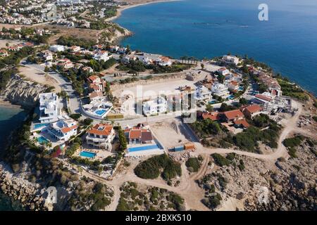 Cyprus, villas buildings on cliff for resort near Paphos city, aerial view. Stock Photo