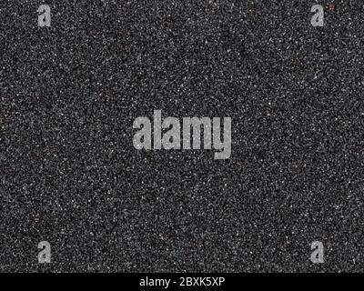 The texture of the abrasive. Abstract background of sand paper. Stock Photo