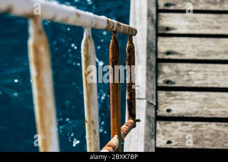 Limassol Cyprus June 07, 2020 View of the renovated wooden pier extensions allowing people to walk over the sea on Limassol promenade in the afternoon Stock Photo