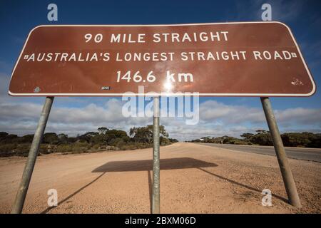Cocklebiddy Western Australia September 15th 2019 : Sign denoting the start of the 90 mile straight road, which is Australia's longest straight road a Stock Photo