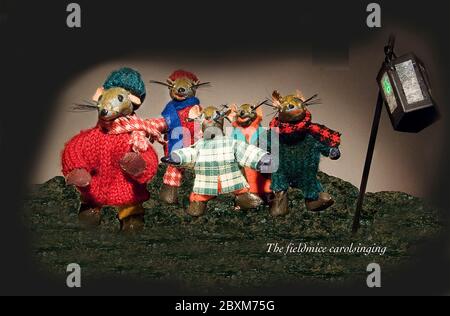 Scenes from Wind in the Willows Children's Book - The Fieldmice carolsinging Stock Photo