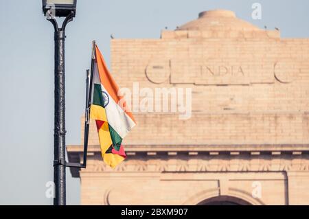 DELHI, INDIA - 05 FEB, 2014 - Indian national flag hanging on street lamp near India Gate in New Delhi, India. Close view. Stock Photo