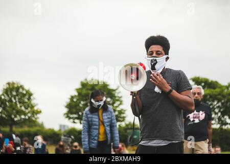 Protest in support of 'Black lives matter' in a park in Haringey, London UK.  Protest for the American George Floyd. Credit Krisztian Sipos Stock Photo