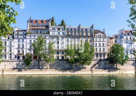 Paris, France - May 6, 2020: Typical Haussmann buildings along the Seine river in Paris Stock Photo