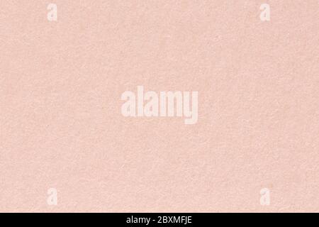 Soft pink paper texture, light background. Macro photo. Stock Photo