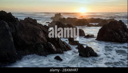 Sunset over the Pacific ocean in Lucia, California Stock Photo