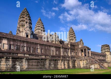 Angkor Wat (Constructed: Early-Mid 12th century, King/Patron: Suryavaman II, Religion: Hinduism) Angkor Wat is surrounded by a moat and an exterior wa Stock Photo