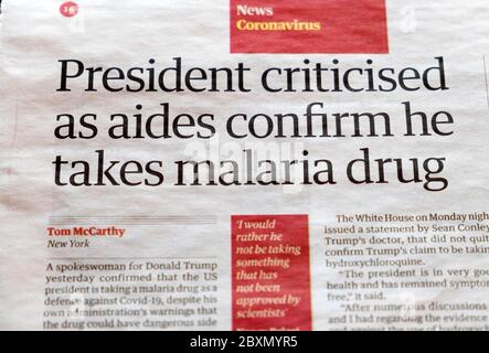 'President criticised as aides confirm he takes malaria drug' coronavirus covid 19 article in The Guardian newspaper on 20 May 2020  London UK Stock Photo