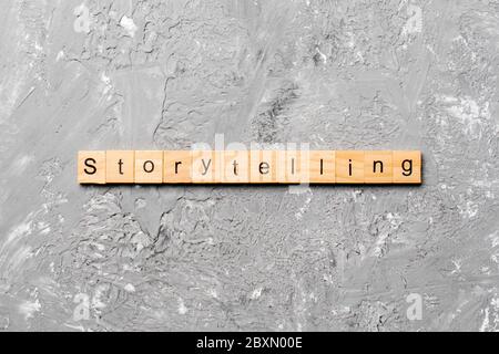 storytelling word written on wood block. storytelling text on table, concept. Stock Photo