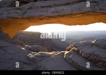 View on Washer Woman Arch through Mesa Arch Stock Photo