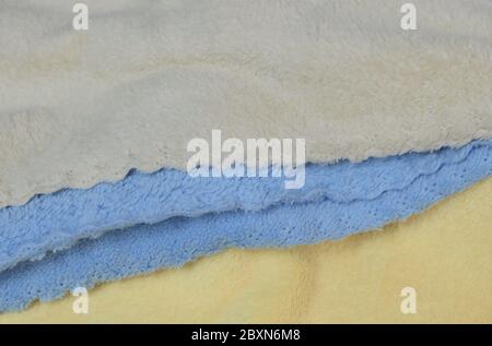 Fabric and Textile, Close Up of Yellow, Blue and Beige Cotton Towel or Terry Texture Background with Copy Space for Text Decoration. Stock Photo