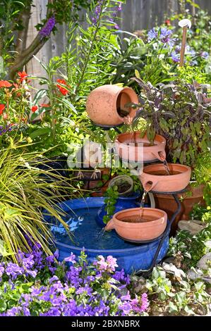 A solar powered small water feature in British garden bought from B&Q