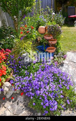 A solar powered small water feature in British garden bought from B&Q