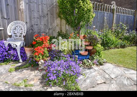 A solar powered small water feature in British garden bought from B&Q