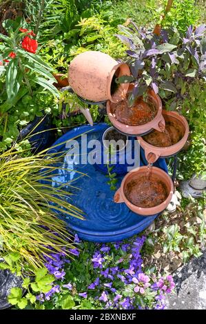 A solar powered small water feature in British garden bought from B&Q