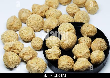 Protein Chunks Soya protein chunks used in vegetarian and vegan food, isolated on a ...