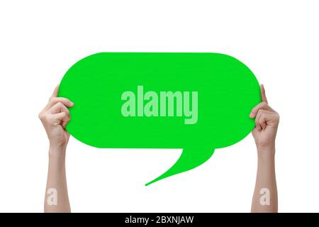 Hand holding an green empty speech bubble, Isolated on white background with clipping path. Stock Photo